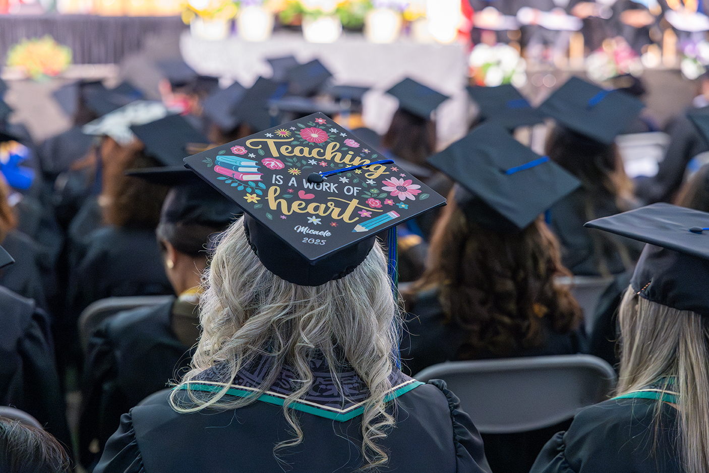 Teaching love message on graduate miter