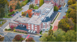 Aerial view of the front entrance to Wellesley campus in fall
