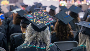 Teaching love message on graduate miter